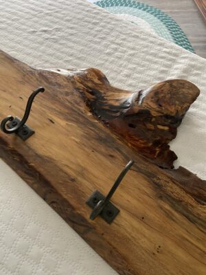 beautiful rustic coat rack made with spalted sweet gum with 5 coat hooks