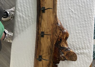 beautiful rustic coat rack made with spalted sweet gum with 5 coat hooks