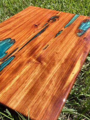 Cedar tabletop with aqua green epoxy resin