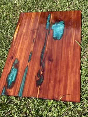 Cedar tabletop with aqua green epoxy resin