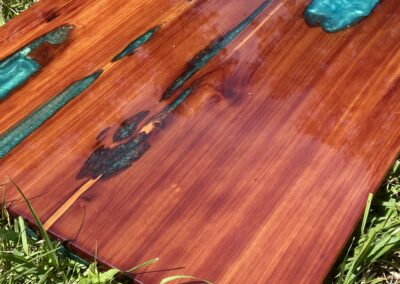 Cedar tabletop with aqua green epoxy resin